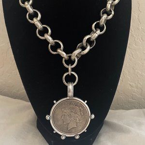 Artisan burnished silver necklace with Silver Dollar Pendant